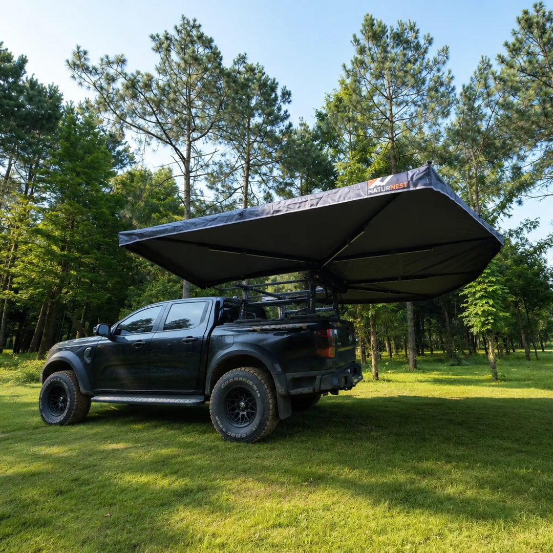 Naturnest 360 Awning side view deployed over a pickup truck