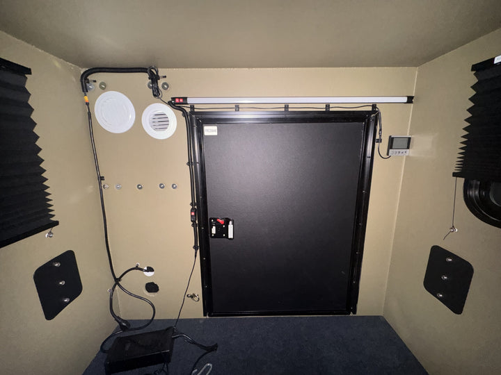 Pre-Owned Freedom Camper 58x79 Tan - interior with LED light bar, vents and AC thermostat