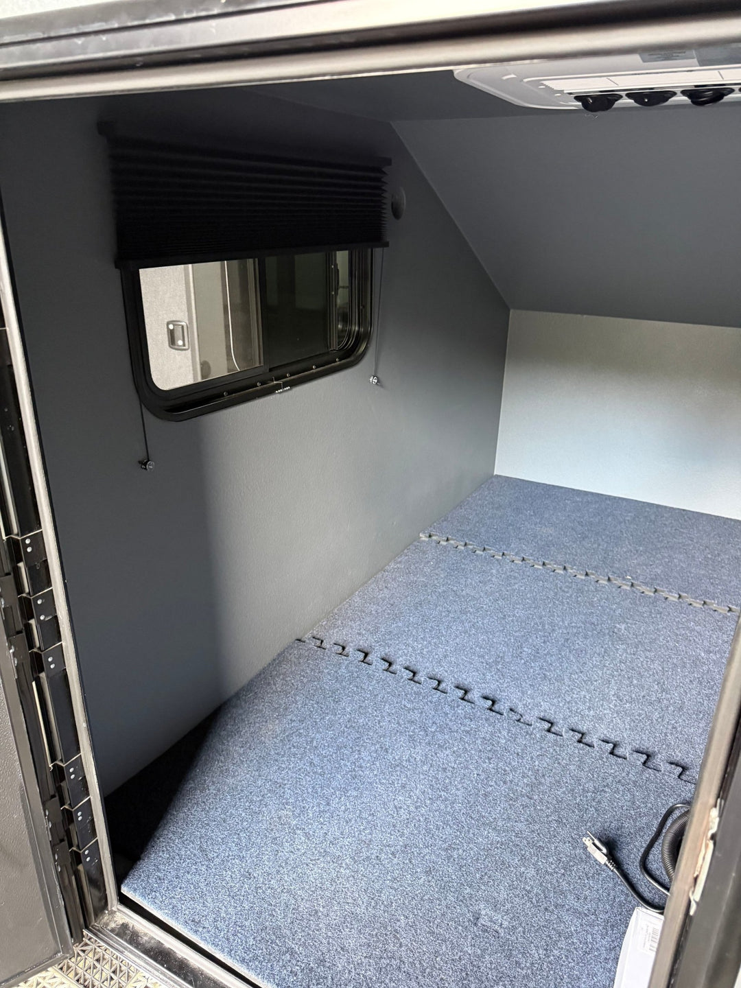 Pre-Owned Freedom Camper 58x89 Gray - interior sliding window with blackout blind and OutEquip ceiling air vents