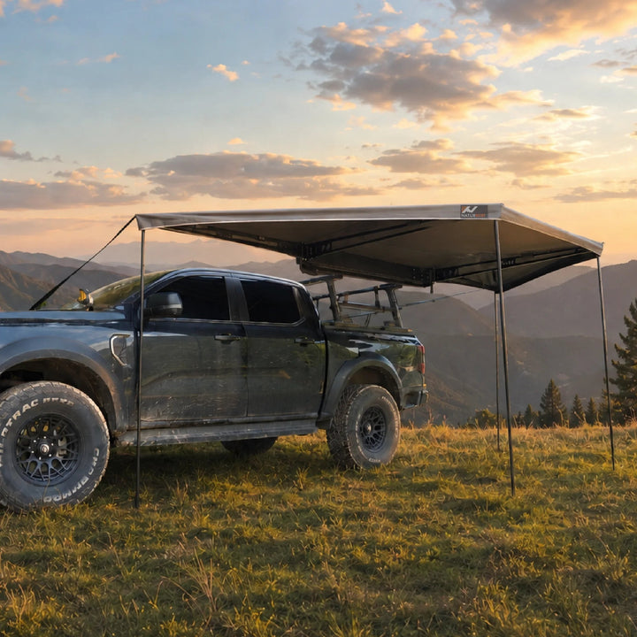 Naturnest 180 Awning deployed alongside an overland vehicle