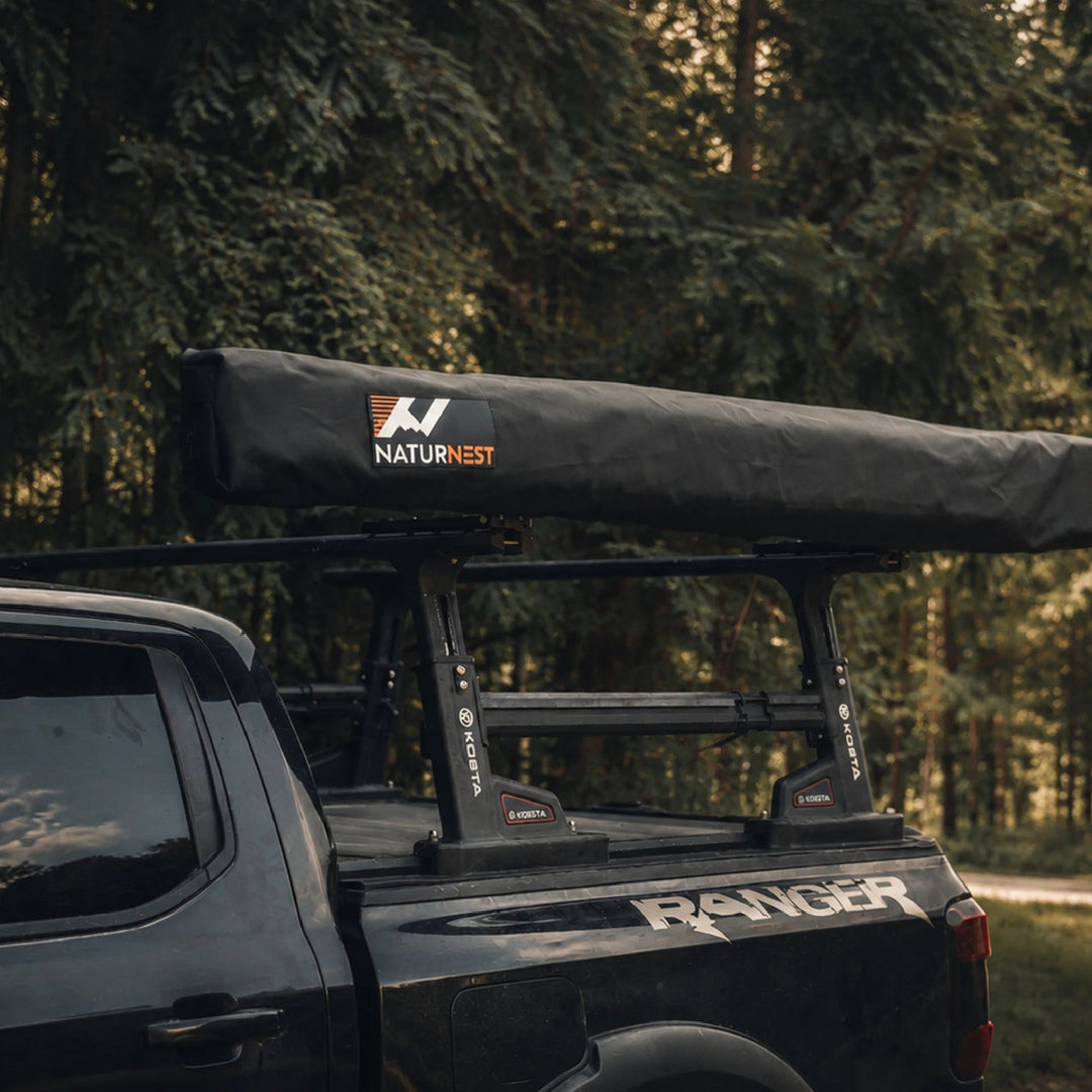 Naturnest 180 Awning packed in its storage bag on a truck bed rack