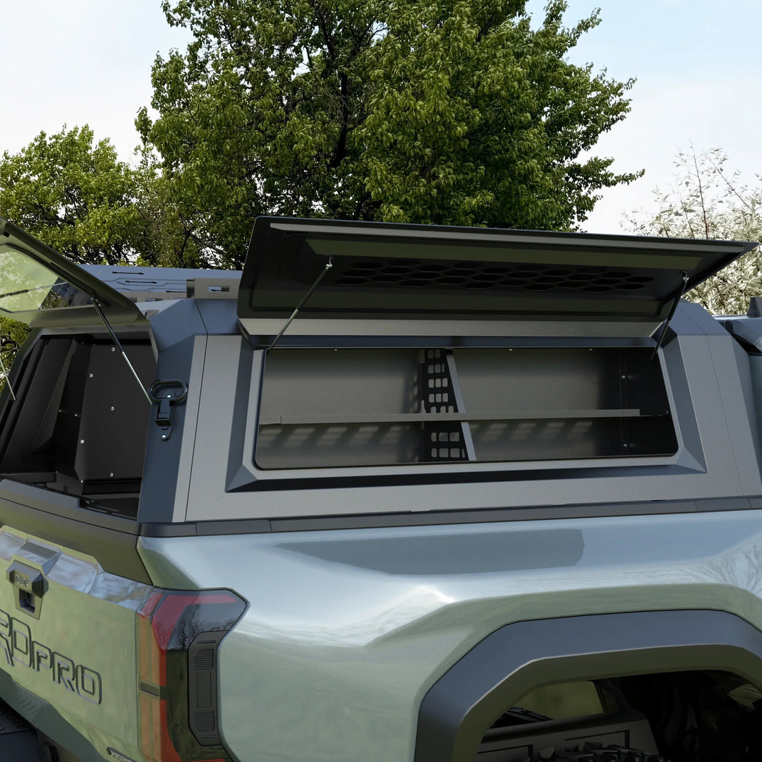 OPENROAD truck cap storage box loaded with gear behind the side window